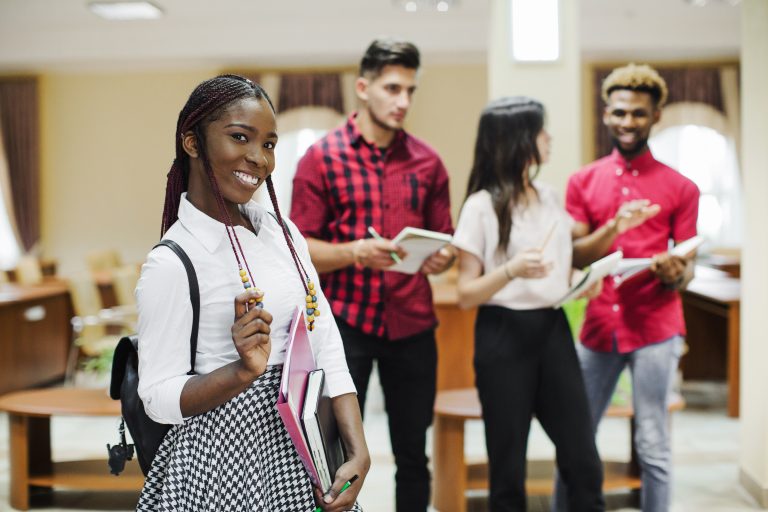 black-international-student-with-white-course-mates