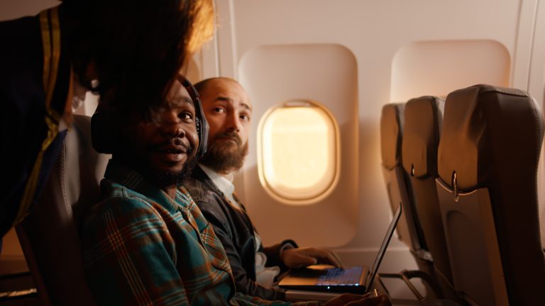 black-man-travelling-in-airplane